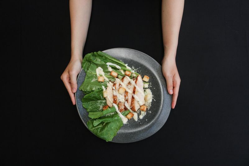 Caesar Salad freshly tossed at Dions